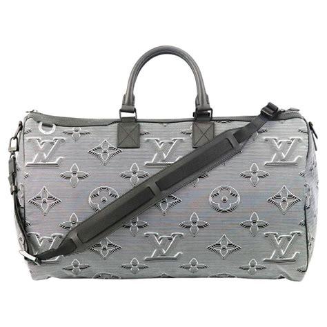 louis vuitton prism pochette|Louis Vuitton keepall 50 bag.